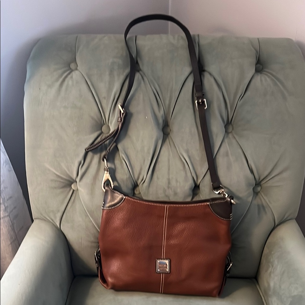Dooney & Bourke Brown Leather Crossbody Bag with Flap Closure